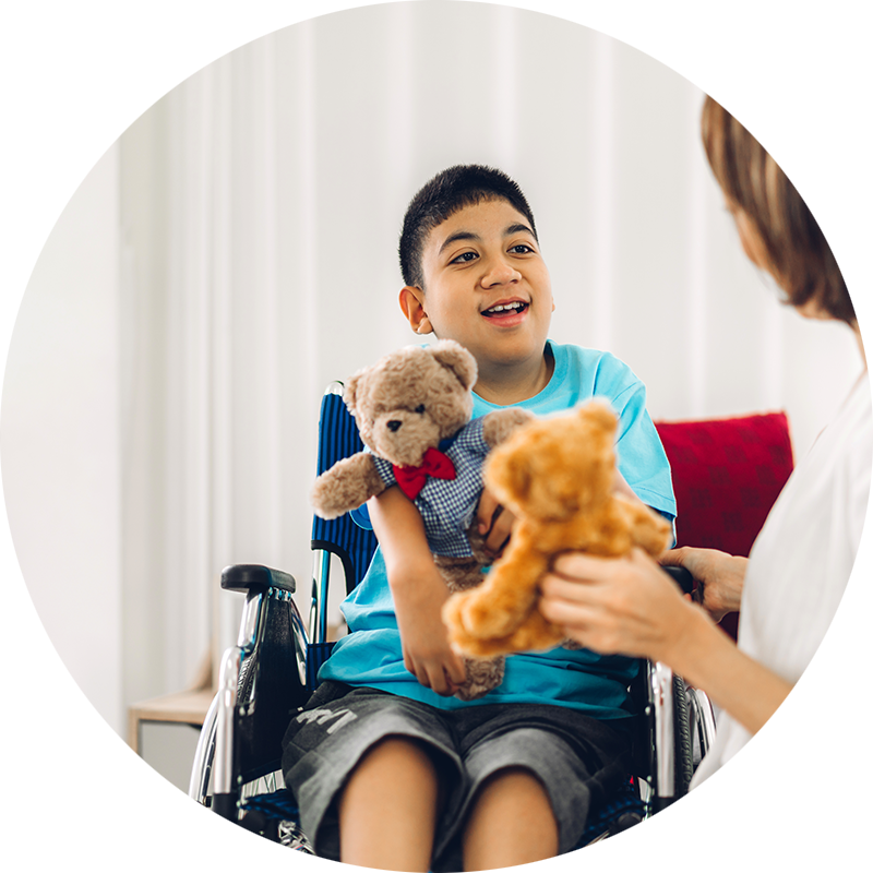 Child in wheelchair therapy